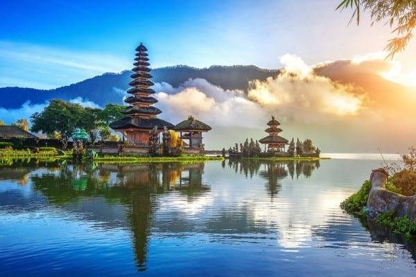 temples in raja ampat surrounded by fog